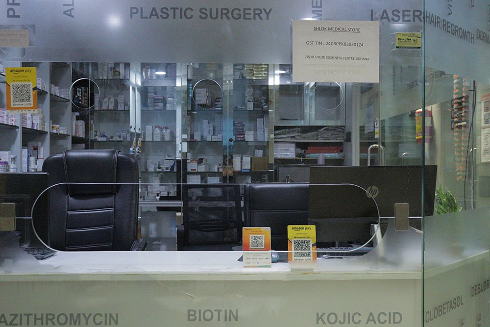 pharmacy store named "Shlok medical store" at surat branch of hairfreehairgrow for hair loss medicines and other treatments